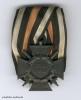 Deutsches Reich, Ehrenkreuz für Hinterbliebene des Weltkrieges 1914–1918, Zweitstück von Reimann, an 1er Ordensschnalle