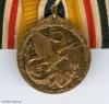 Deutsches Reich, China-Denkmünze in Bronze, an 1er Ordensschnalle
